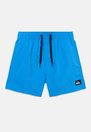 Modri kopalni kratki hlači z elastičnim pasom, črno vrvico za zategovanje, stranskimi žepi in majhno črno logotipno nalepko na levi nogavici.