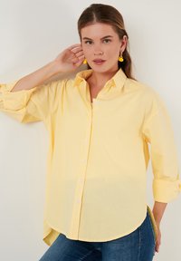 LELA LOOSE FIT - Button-down blouse - yellow