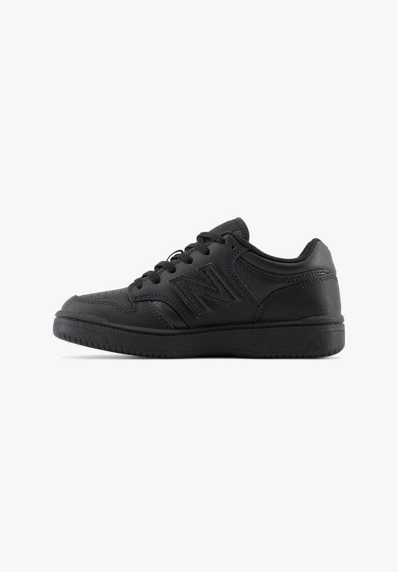 Black athletic shoe with a smooth leather upper, rounded toe, lace-up design, and a textured rubber sole, featuring a subtle logo detail.