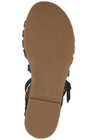 Brown rubber sole with horizontal ridges, featuring black straps. Markings include "MADE IN SPAIN" and brand logo. Size 37 indicated.
