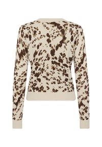 Knit sweater in cream with brown abstract splotches. Features long sleeves and a ribbed hem. Soft texture with a fitted silhouette.
