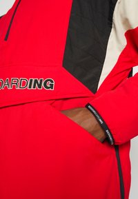 DC Shoes TRANSITION REVERSIBLE ANORAK - Casaco de snowboard - racing red