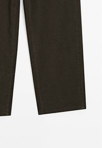 Dark olive green trousers made from cotton blend fabric, featuring a straight leg design, double-stitched seams, and no visible hardware.