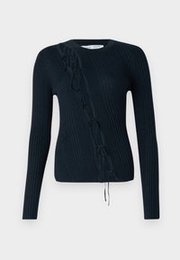 Suéter de punto acanalado de manga larga en azul marino oscuro, con lazos decorativos a lo largo de un lado y cuello redondo. Tejido suave y texturizado.