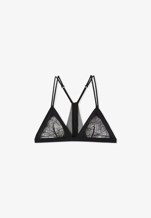 Bralette en dentelle noire avec des bonnets triangulaires, motif floral délicat, bretelles réglables et un panneau central en maille pour un détail de design supplémentaire.