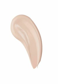 Lys beige creme med en glat tekstur, påført i en buet, strib-lignende form på en hvid baggrund.