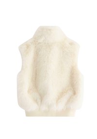 Vesti faux turkkia pehmeässä valkoisessa, jossa on korkea kaulus ja ribattu helma. Ylellinen rakenne, jossa on pehmeä tunne ja ilman näkyviä kiinnityksiä.