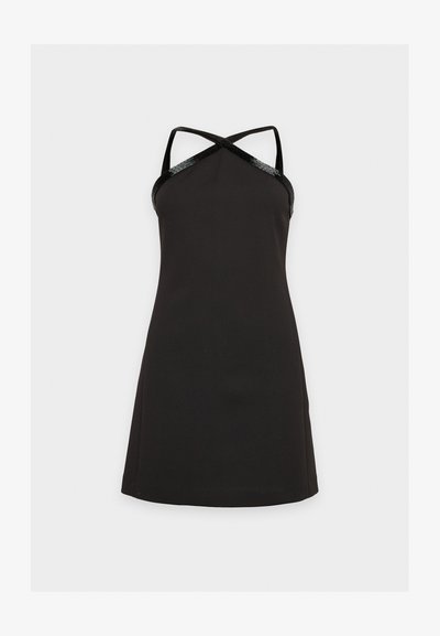 Robe noire sans manches avec un bustier ajusté, un ourlet évasé et de fines bretelles croisées.