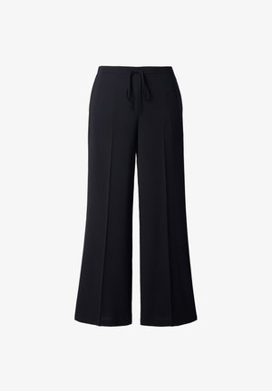 Schwarze, weit geschnittene Hosen aus einem weichen Material, mit einem Kordelzugbund und einer glatten Textur ohne sichtbare Muster oder Akzente.