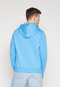 Tommy Hilfiger MONOGRAM HOODIE - Sweatshirt - blue spell