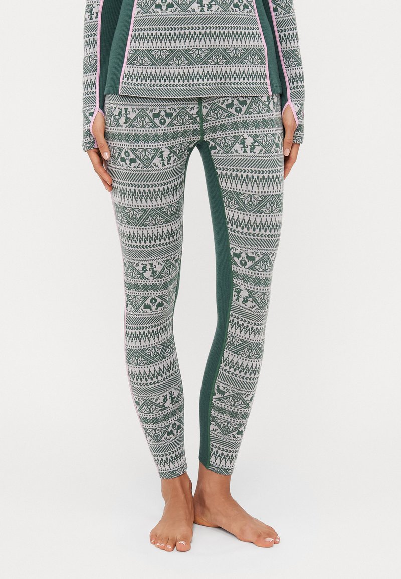 Leggings with a geometric pattern in green and gray, featuring a smooth texture, contrasting side panels, and subtle pink accents.
