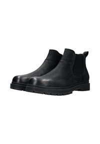 Schwarze Chelsea-Boots aus Leder mit elastischen Seiteneinsätzen, rundem Zehenbereich und einer profilierten Gummisohle mit Rillen für besseren Grip.
