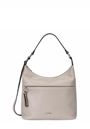 Beige leren handtas met zilveren rits en zwart afgewerkt handvat, met een voorvak met rits en decoratieve tassel.