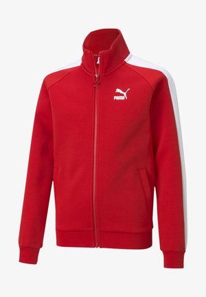 Rote Zip-Jacke aus glattem Material, mit weißen Seitenpanelen und hohem Kragen. Puma-Logo in Weiß auf der Vorderseite. Zwei Seitentaschen.