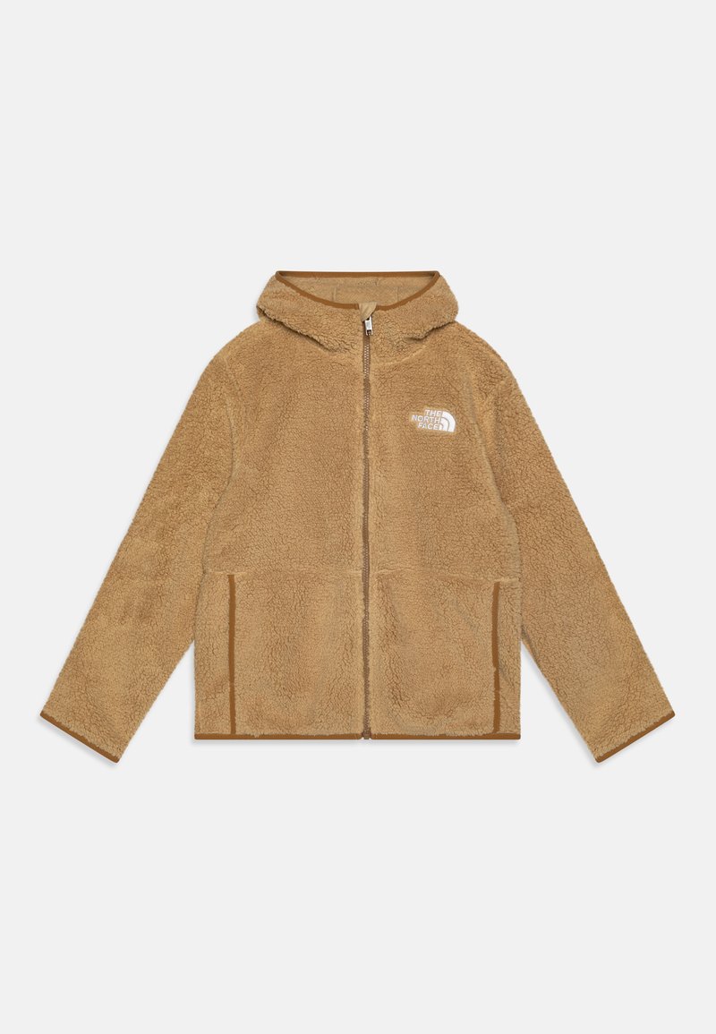 Chaqueta de forro polar color beige con capucha, cremallera frontal y dos bolsillos laterales. Presenta un logo blanco en el lado izquierdo del pecho y un ribete marrón a lo largo de los bordes.