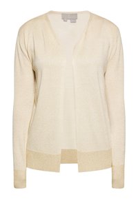 Vaalean beige-neulejakku, joka on valmistettu pehmeästä, teksturoidusta neuloksesta. Siinä on V-muotoinen kaula-aukko, auki oleva etuosa ja metallinhohtoiset yksityiskohdat helmassa ja hihoissa.