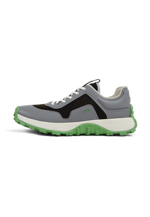Gray athletic shoe with a mesh and synthetic upper, black accents, green rubber sole, and white laces; features textured outsole for grip.