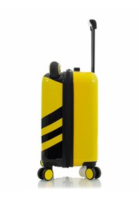 Valigia rigida di colore giallo lucido e nero, con strisce verticali nere, manico retrattile e quattro ruote gialle abbinate.
