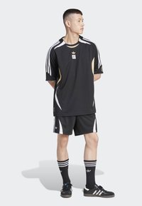 adidas Originals ADIDAS NTS RADIO - Sports T-shirt - black