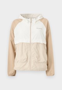 Veste à capuche beige et blanche Columbia avec fermeture éclair à l'avant et deux grandes poches avant sur un fond uni.