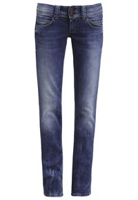 Jean skinny en denim, de couleur bleu foncé, avec deux poches avant et une fermeture éclair avec deux boutons à la taille.