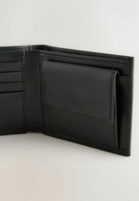 Black leather wallet with stitched edges, featuring multiple card slots and a central pocket. Smooth texture, compact design.