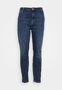 Mörkblå denimjeans med hög midja, smal passform och en sliten reva på höger knä. Har standard femficksdesign och metallbeslag.