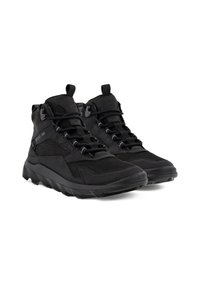 Scarpe da trekking nere con tomaia in mesh e materiale sintetico, suola in gomma texturizzata, design con lacci, altezza alla caviglia con linguetta per una facile calzata.