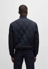 BOSS OSTRONG - Bomber stiliaus striukė - dark blue