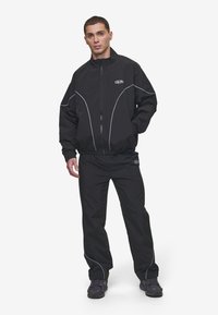 Pegador MERCER TRACK JACKET - Regnjakke - black