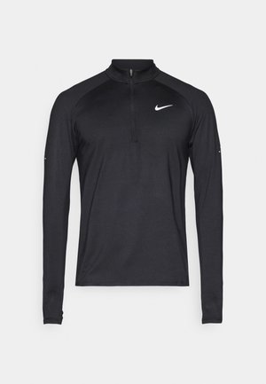 Black long-sleeve athletic top with quarter zipper and white Nike swoosh logo on the left chest, displayed on a plain background.