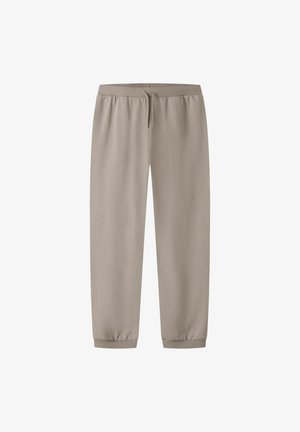 Pantaloni sportivi beige chiaro in tessuto morbido, con vita elastica e coulisse, orli con polsini e vestibilità comoda per il massimo comfort.