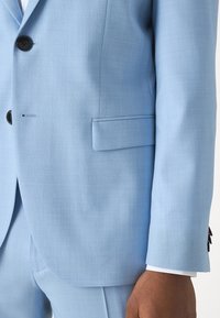 HUGO ARTI HESTEN - Completo - light blue