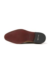 Leather sole with a pointed shape, featuring a dark brown upper, contrasting red heel, and engraved brand detail. Smooth texture overall.