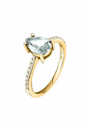 Anello d'oro con una pietra di acquamarina a forma di pera, con piccoli diamanti trasparenti incastonati lungo la fascia per un tocco di eleganza. Finitura liscia e lucida.