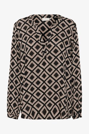 Blouse noire à manches longues présentant un motif en losanges crème et marron, avec un décolleté en V et une coupe décontractée. Texture de tissu douce.