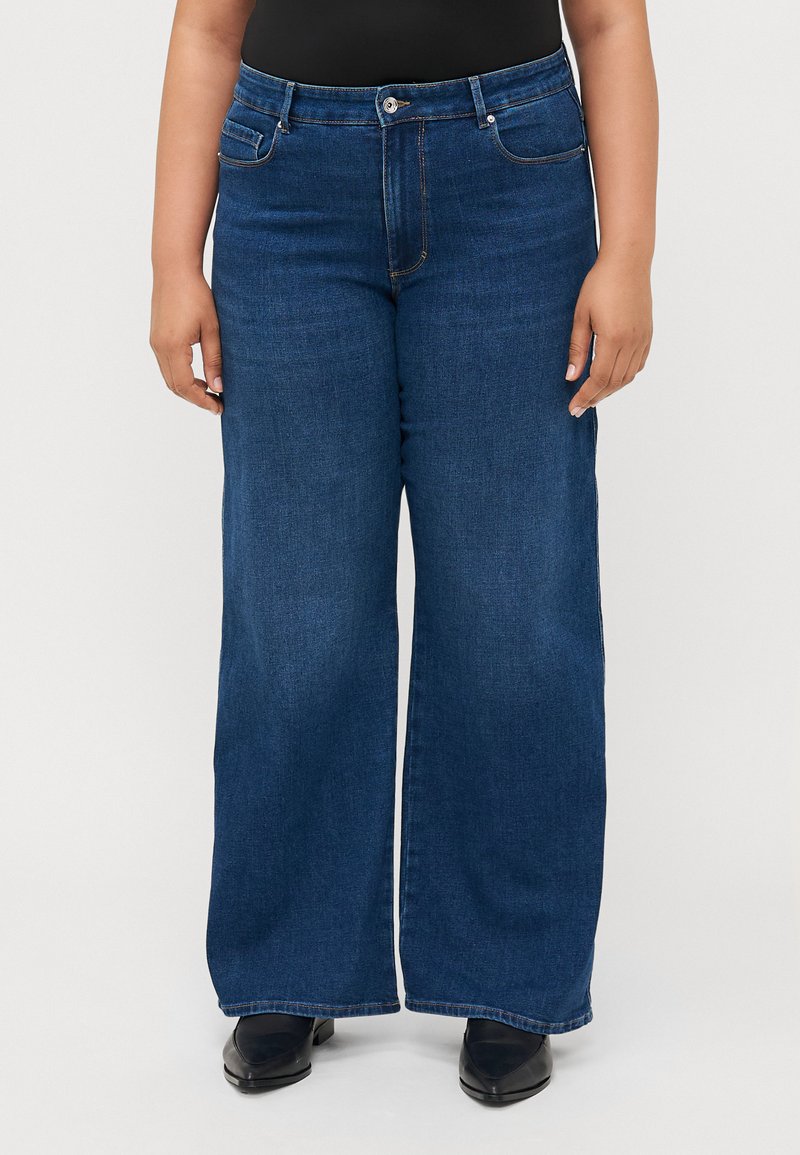 Wide-leg blue denim jeans with five pockets, a button and zipper closure, and a smooth texture, ending above ankle height.