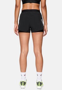 Fila - Krótkie spodenki sportowe