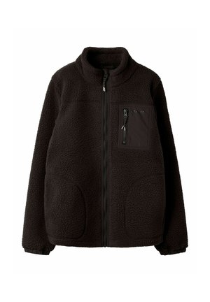 Fekete, teljes hosszában cipzáras polárdzseki álló gallérral, rugalmas mandzsettákkal, két első zsebbel és egy cipzáras mellzsebbel, amely szöveti részletet tartalmaz.