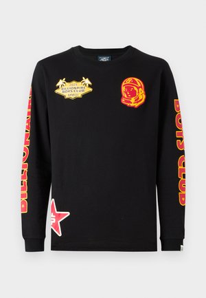 Hosszú ujjú fekete gyapjúpóló piros és sárga grafikai mintákkal, köztük asztronautával és csillaggal, „Billionaire Boys Club” felirattal.