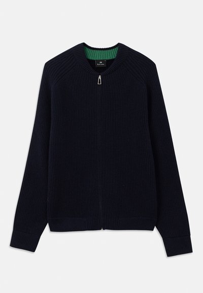 Ναυτικό πλεκτό ζακέτα με ριπ υφή, πράσινη ριγέ γιακά, πλήρη φερμουάρ και μακριά μανίκια. Λείος υφασμάτινος χαρακτήρας με στενή εφαρμογή και καθαρές γραμμές.