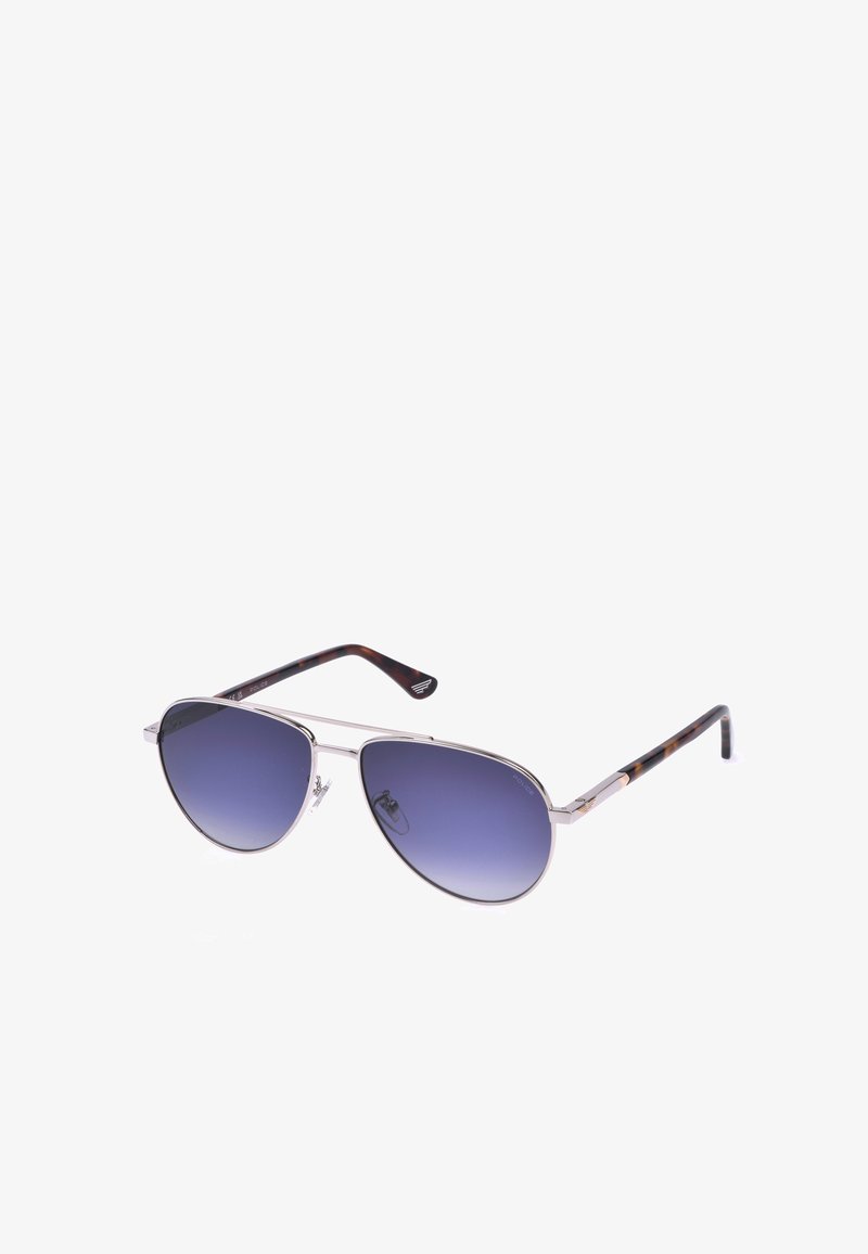 Lunettes de soleil aviateur à monture métallique argentée avec verres dégradés bleu foncé et branches à motif écaille.
