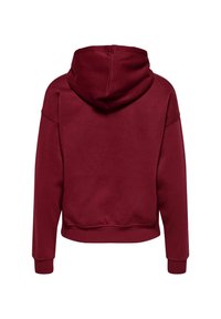 Felpa con cappuccio bordeaux dal design accorciato, maniche lunghe, polsini e orlo a coste. Tessuto morbido e testurizzato con una finitura semplice e pulita.