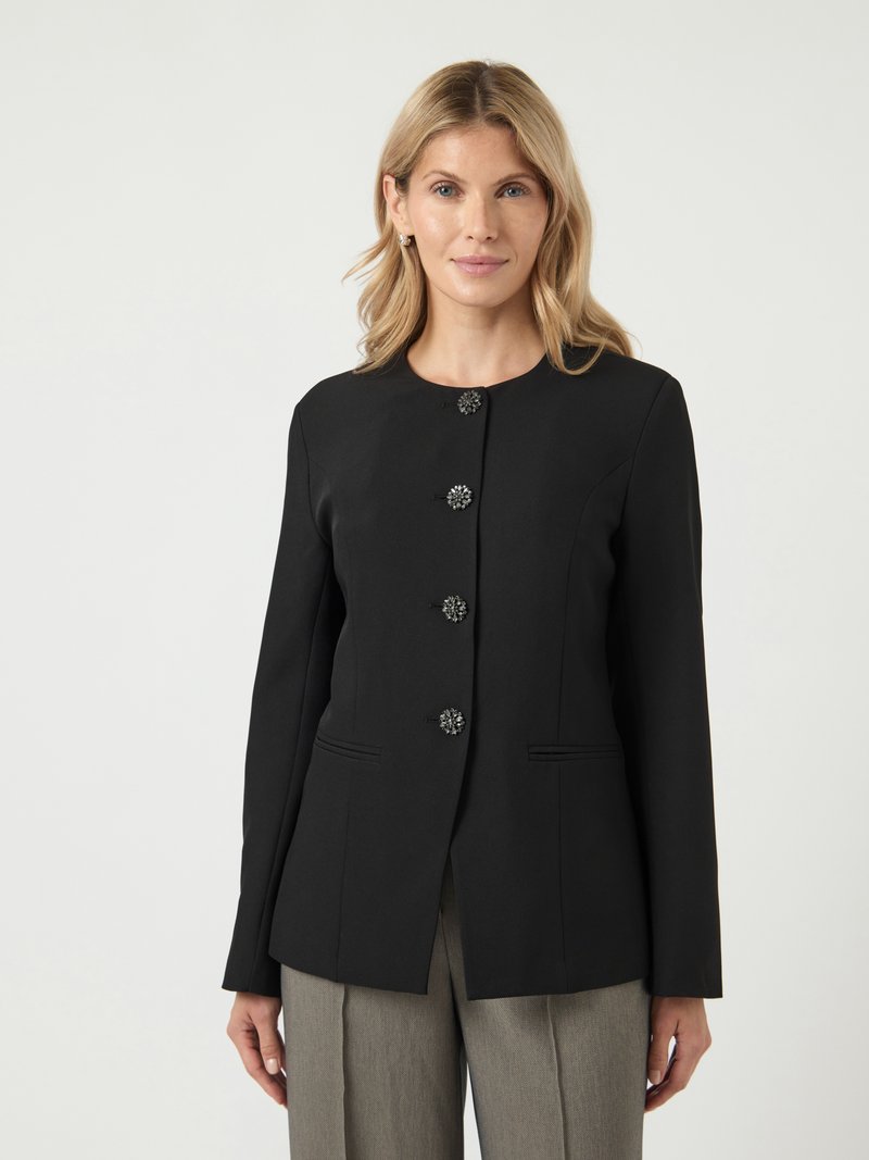 Black blazer with a fitted design, featuring a round neckline and six button closures with decorative embellishments. Tailored fit with side pockets.
