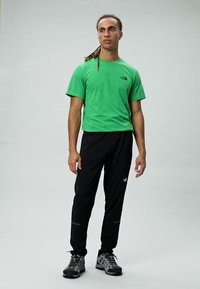 The North Face MOUNTAIN ATHLETICS TRAJECTORY PANTS - Pantaloni outdoor - black