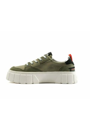Olive green sneaker with a suede upper, white chunky sole, and grey laces. Features black accent at the heel and red pull tab.