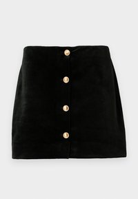 Μαύρη μινι φούστα από βελούδο με πέντε κουμπιά σε χρυσή απόχρωση στο μπροστινό μέρος, διαθέτοντας λεία υφή και δομημένο σχήμα.