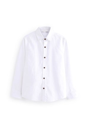 Chemise blanche à manches longues avec boutons foncés et col classique, présentée sur fond blanc.