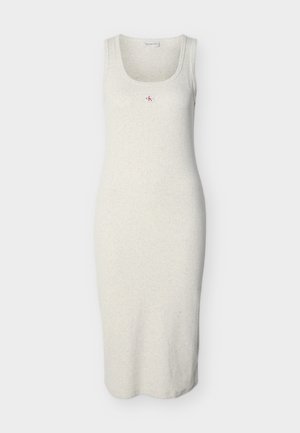 Lysegrå, ermeløs tettsittende kjole laget av myk bomull. Har rund hals og en liten logo midt på. Midt på leggen i lengde.