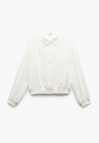 Camicia bianca con colletto, maniche lunghe e chiusura a bottoni. Realizzata in tessuto liscio con polsini elasticizzati e vita aderente.